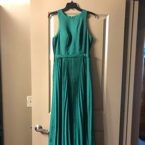 NEVER BEEN WORN forest green bridesmaid dress. Size six. Very flattering!